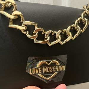 Love Moschino (black cross body bag -negotiable)